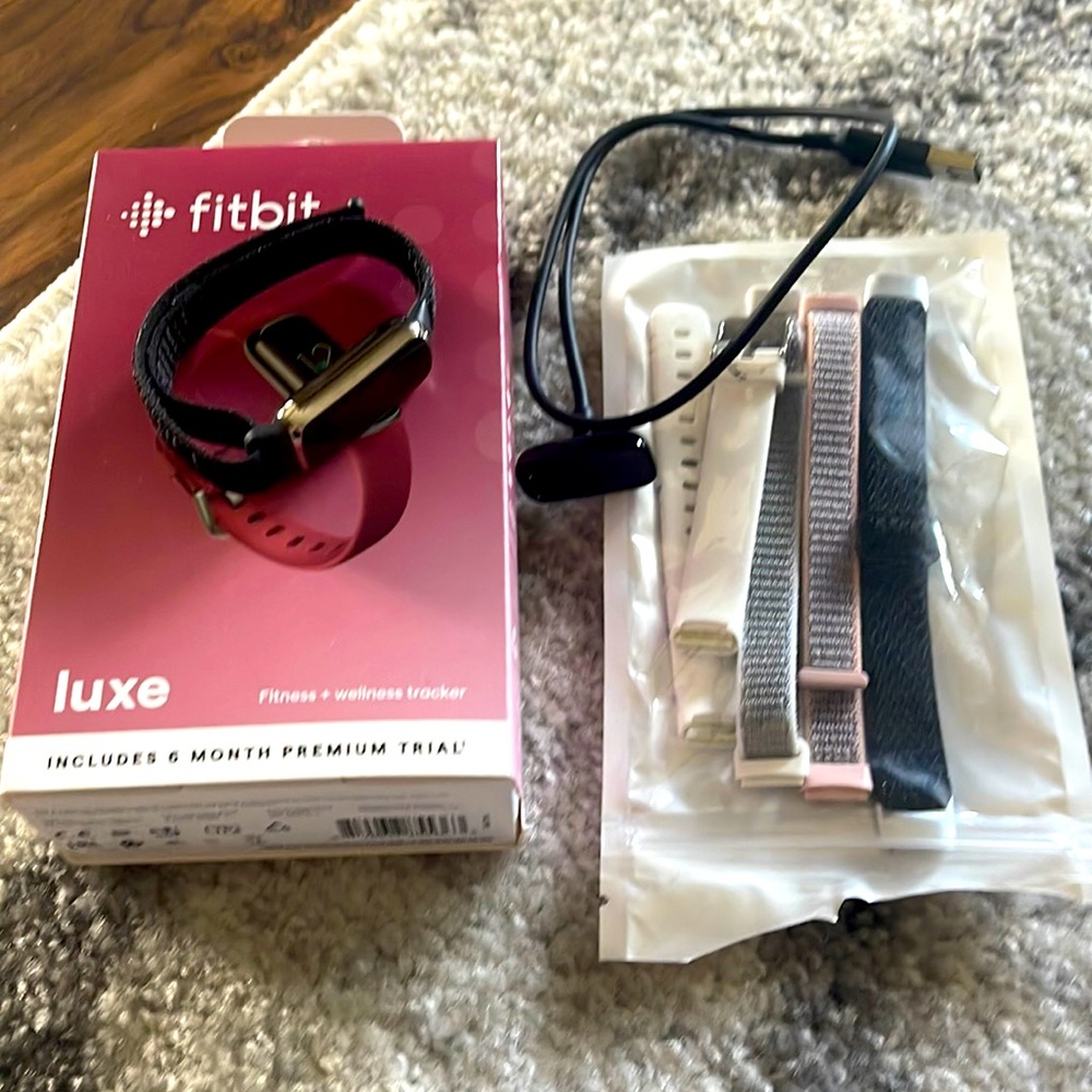 Fitbit Luxe smartwatch (Includes charger, original case & 4 bands)